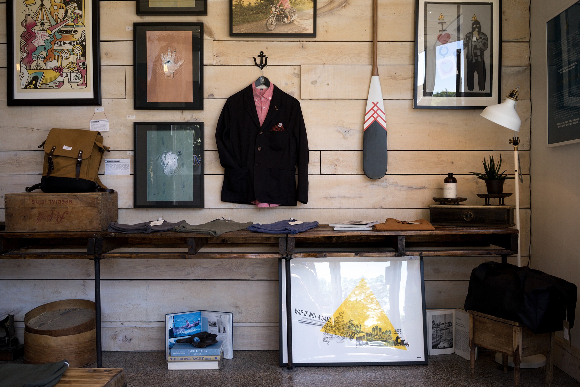 storefront with suit and pictures