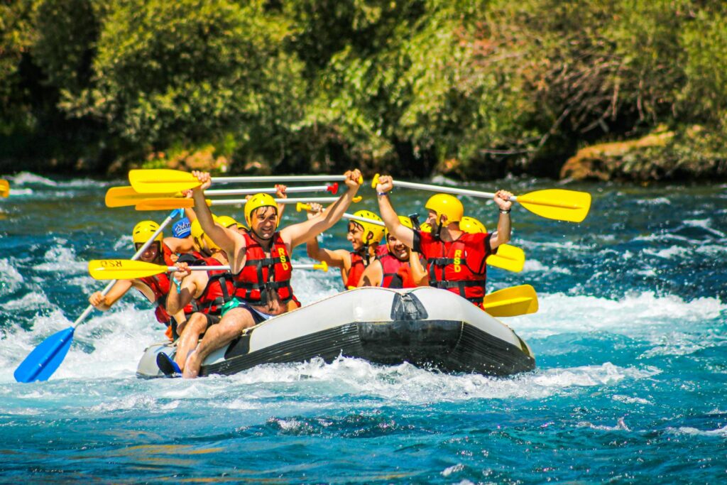 People white water rafting
